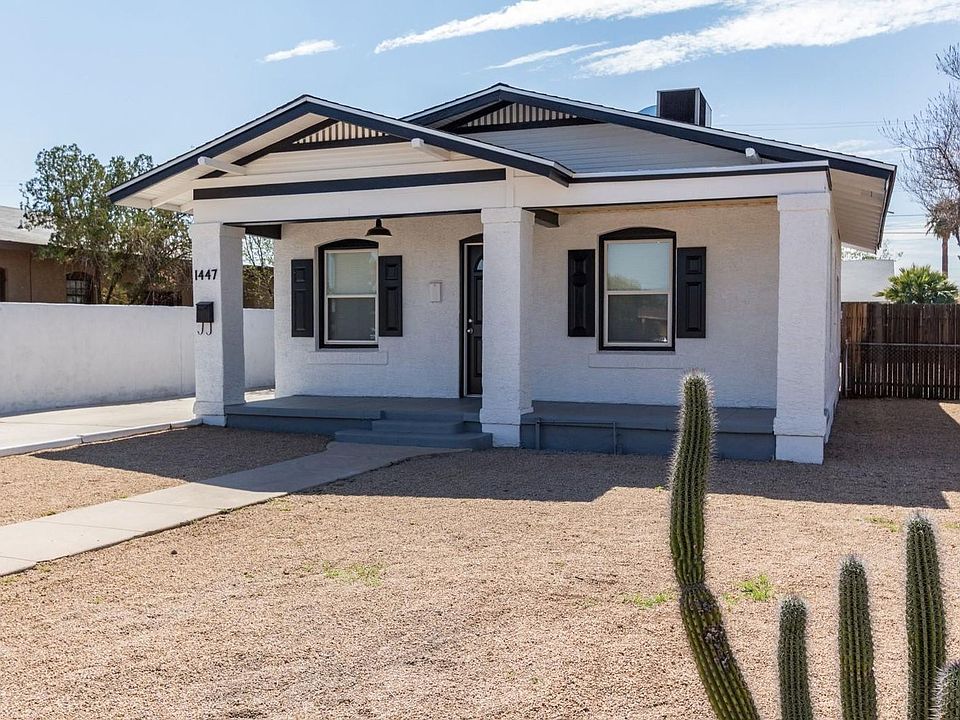 Historic Garfield Park Single Family Home, fully updated on Palm Tree lined Street.