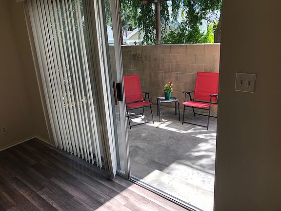 Sliding doors lead to covered patio area