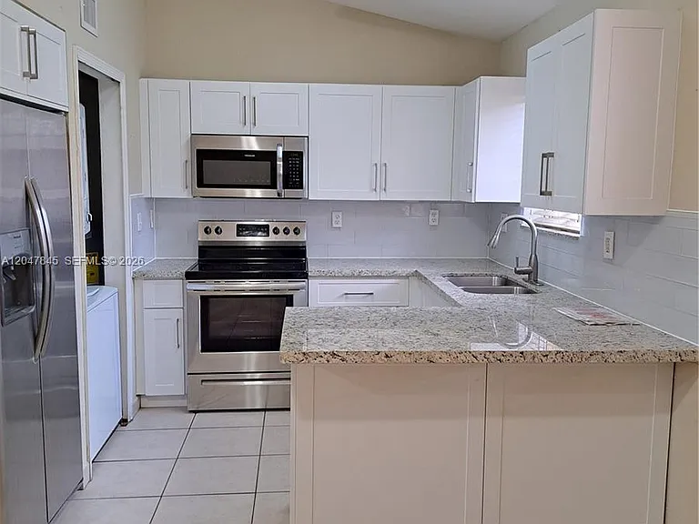 17318 NW 74th Ave #202 — Photo 2