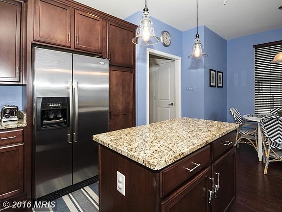 Immaculate eat-in Kitchen: handsome wood!