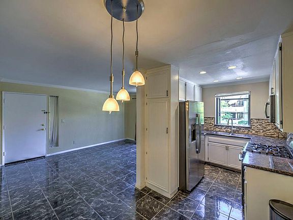 3rd image of 18028 Saratoga Way Unit 555