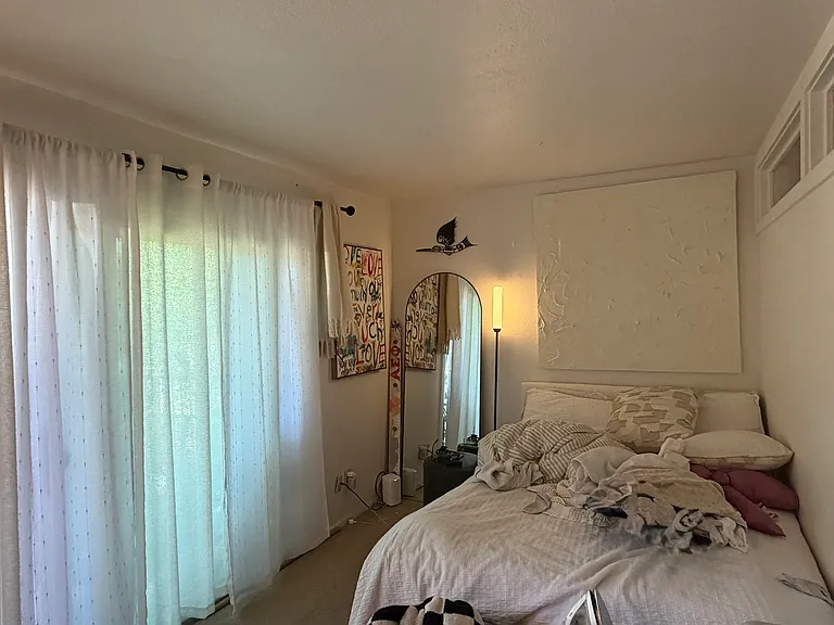 Upstairs bedroom with balcony