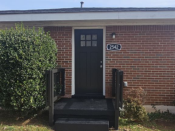 Front door of 2542 McAfee. Right side of duplex