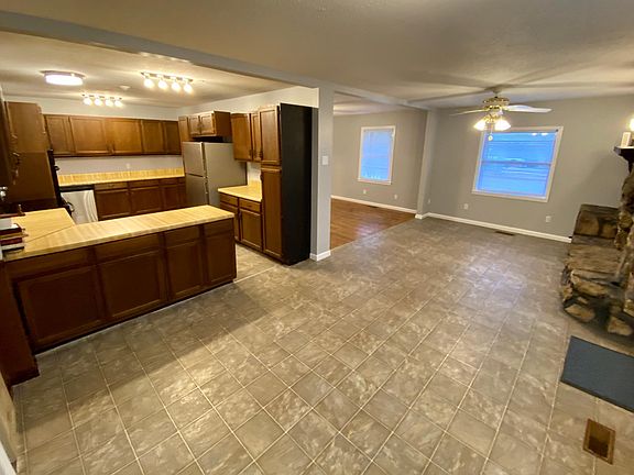 Large kitchen with plenty of cabinets and all new appliances.