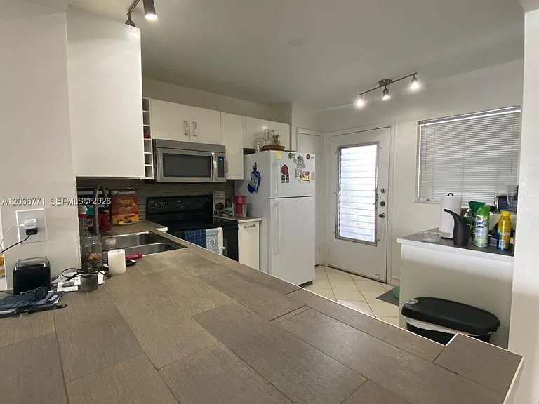 873 NE 195th St #308 — Photo 18