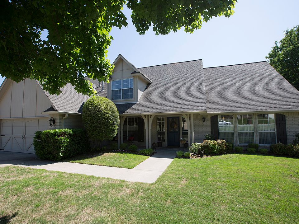 Step away from the ordinary and into this beautifully updated home on lush corner lot in Jenks Schools.