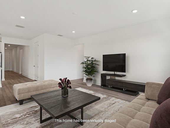 This home has been virtually staged Gathering room