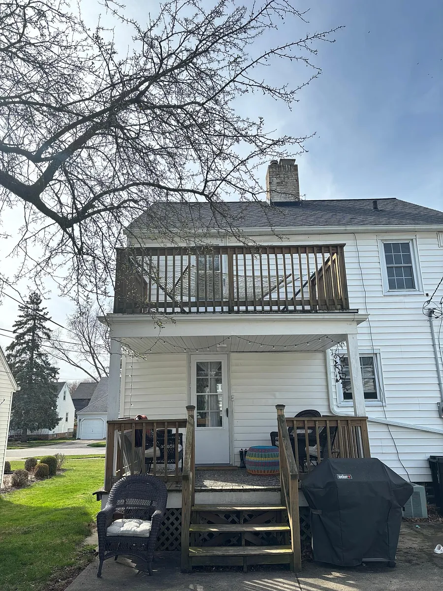 Back of house with the patio and balcony. - 357 Elmwood Rd