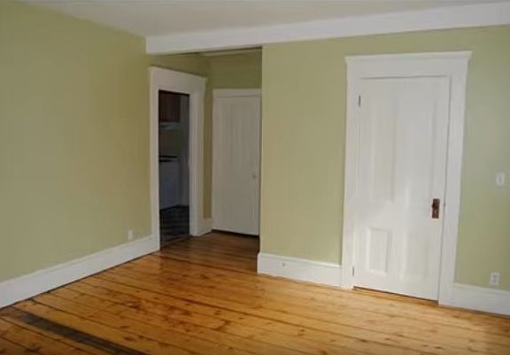 Living room with pine floors and lots of light