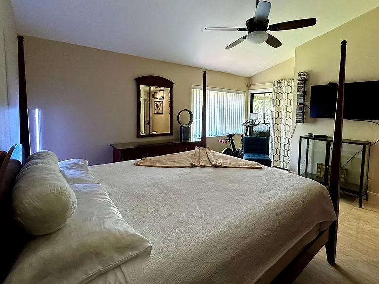 Master Bedroom with access to enclosed balcony
