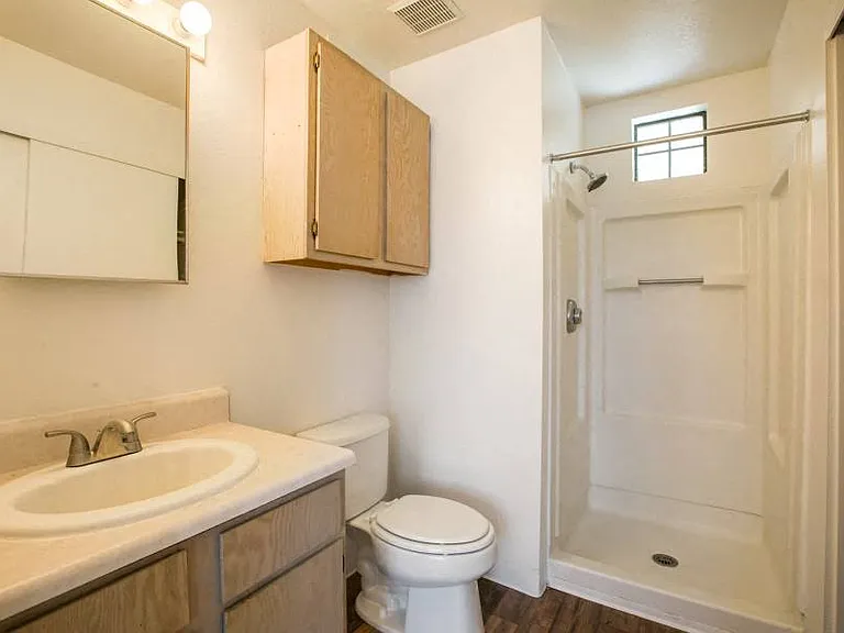 Bathroom with extra storage and a walk in shower