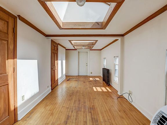 WHAT A LOVELY SPACE - this is the den and the doors go into the cozy bedrooms.