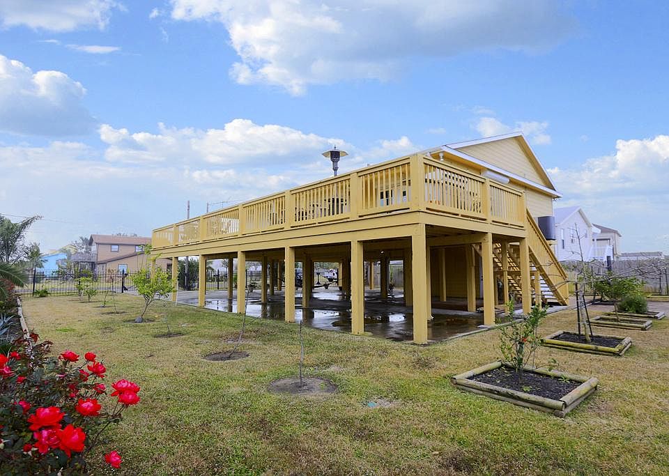 Located on 4 lots that have fruit trees and many flowering ornamental trees.