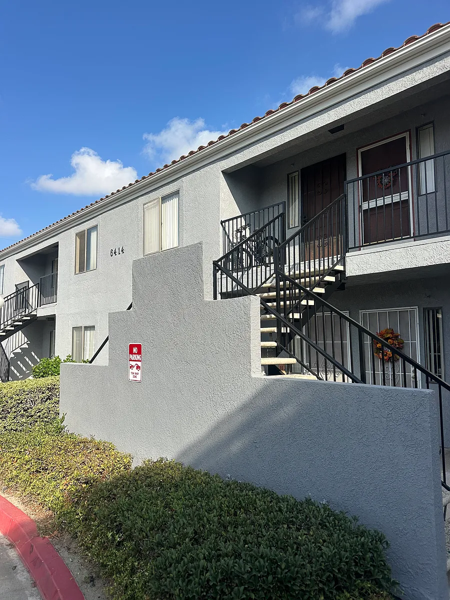 Building 6414 is another one bedroom one bathroom face the back of the property and more carport parking space. - Citrus Court Apartments