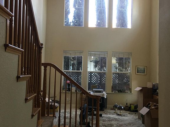 Two story vaulted ceiling in living room