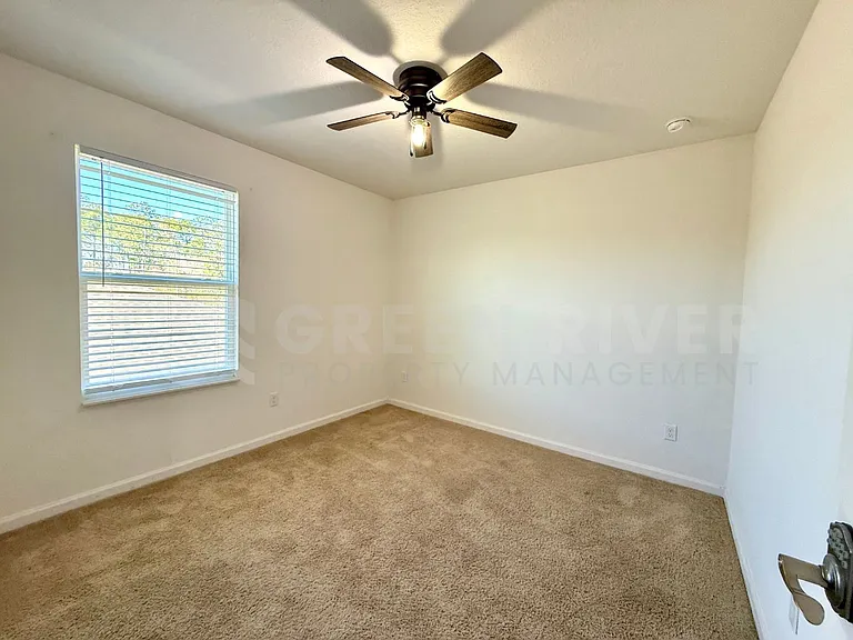 8704 Lake George Cir W — Photo 30