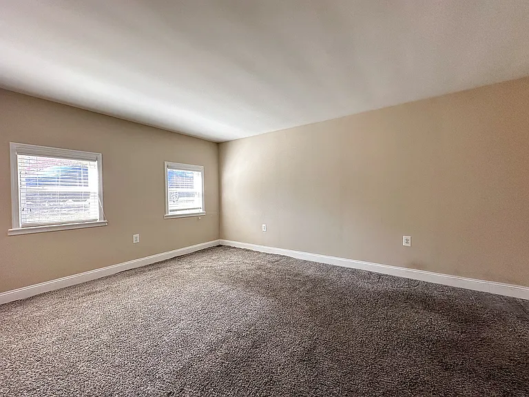 Spacious Carpeted Bedroom