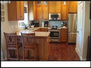 As well as cherry cabinets and stainless appliances
