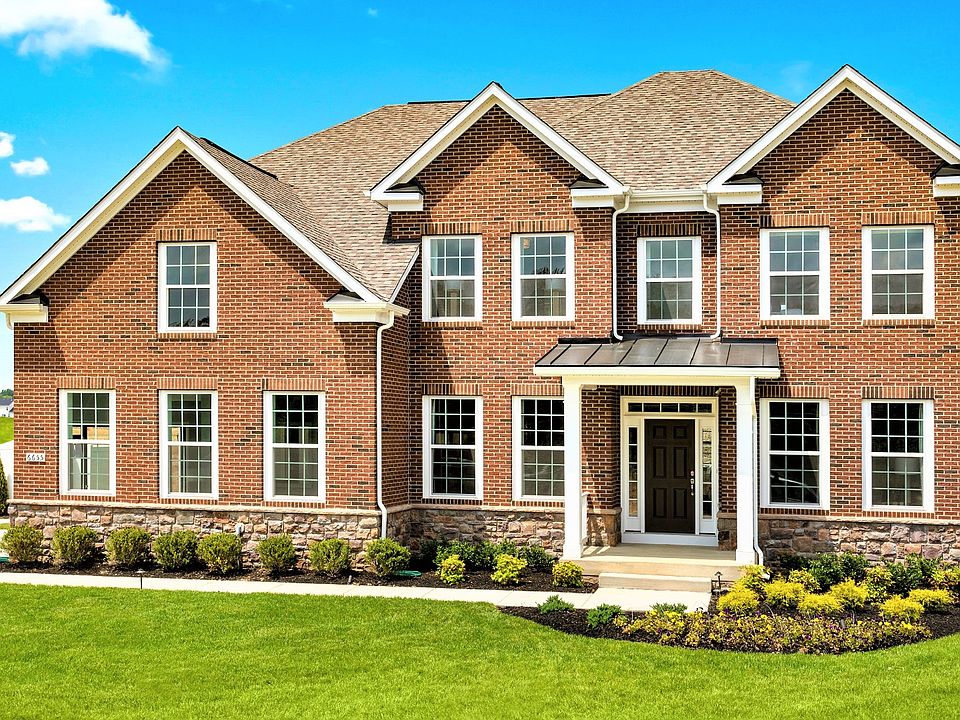 Castlerock II Exterior view, two story family home with a 2-car garage