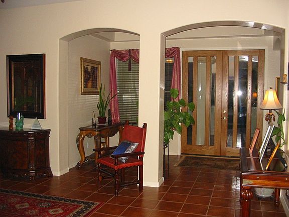 Beautiful upgrades include glass paneled wooden doors.