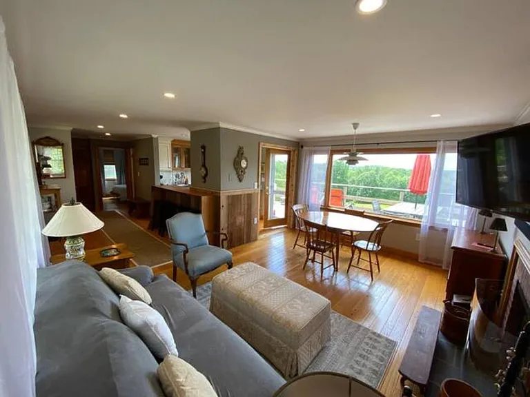 Open floor plan -LR/DR, breakfast bar, kitchen, entry hall to bedrooms / bathroom