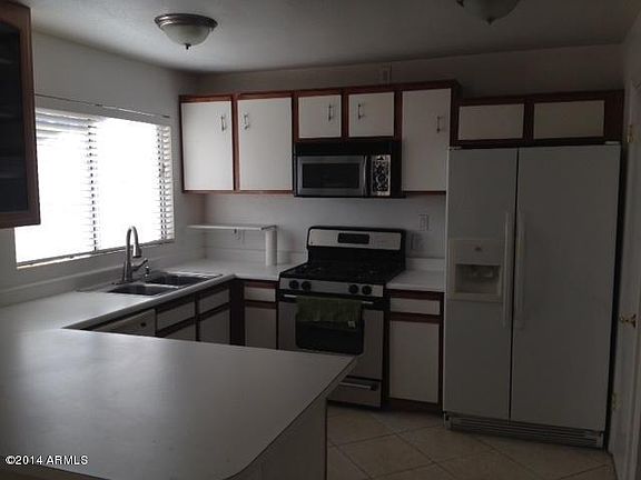 3rd image of 9919 W Meadowbrook Ave #0