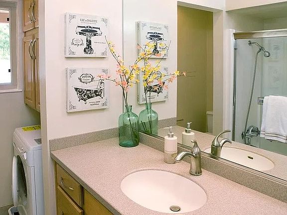 Full bath with washer dryer combo