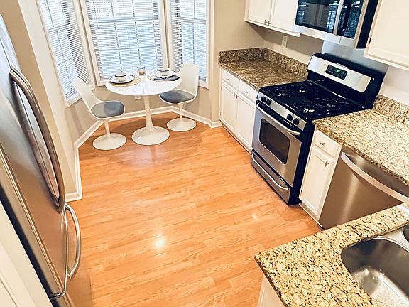 Bright kitchen with large pantry.