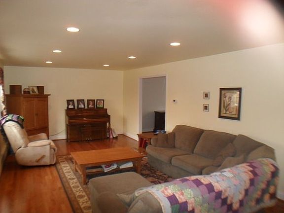 Large Living Room with Hardwood Floors and Recessed Lighting!