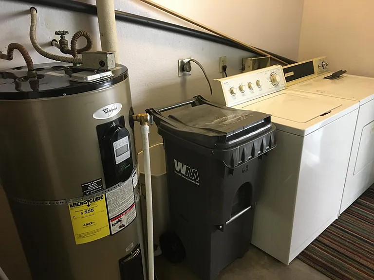 Garage, programmable water heater, electric washer and dryer