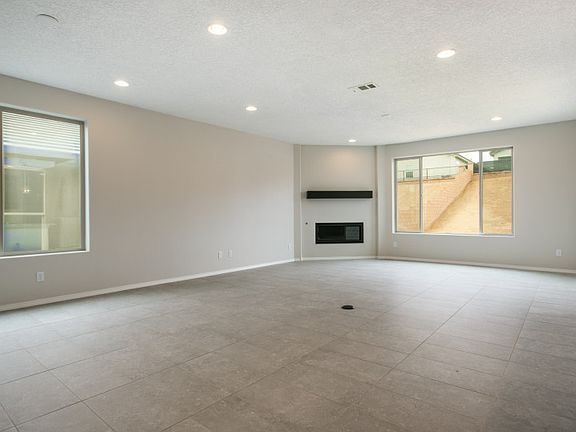The downstairs living areas feature stylish tile throughout.