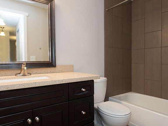 The spa-like bathroom is all new with designer tile, lots of