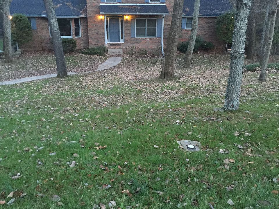 Home is nestled on acre lot