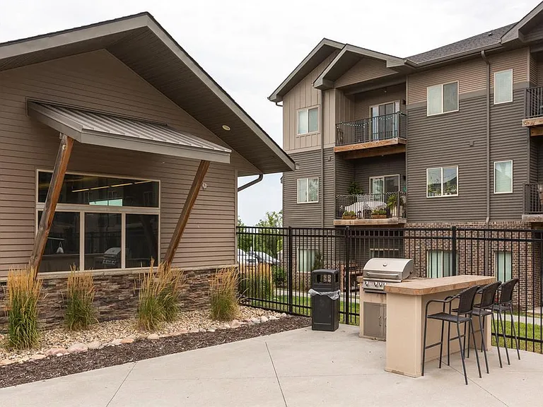 Community grilling area by clubhouse at Avenue 204.