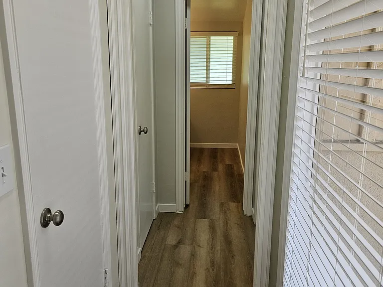 Entry Hall with Coat Closet Leading to Master Bath and Master Bedroom