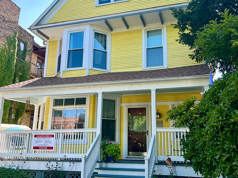 Front of the house with new porch