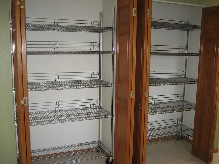 Double pantry with storage racks