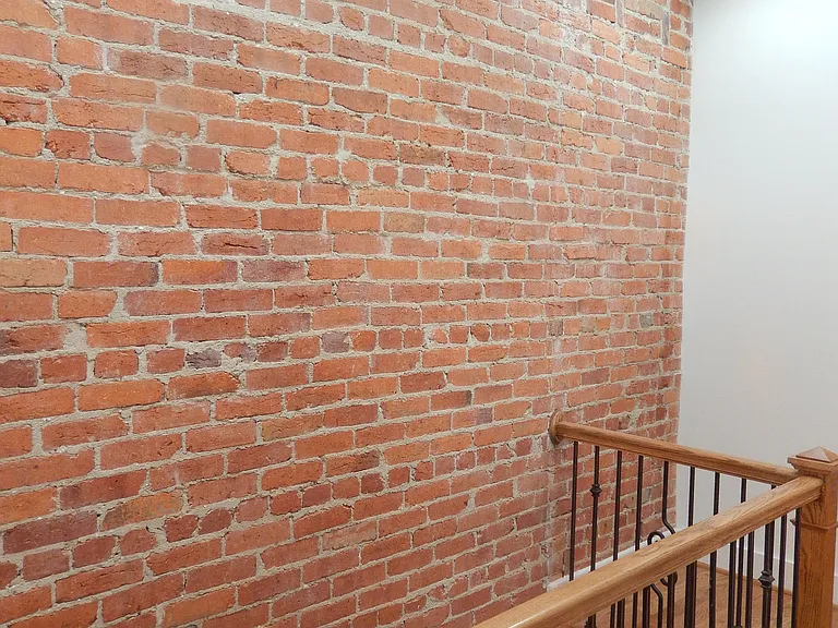 Third floor landing with 4 skylights.