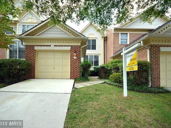 Garage with entrance to foyer