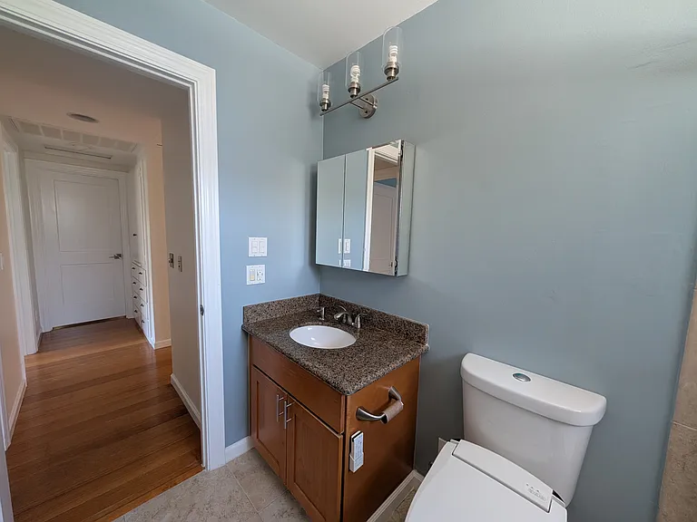 Hallway bathroom, facing master bedroom and living room.
