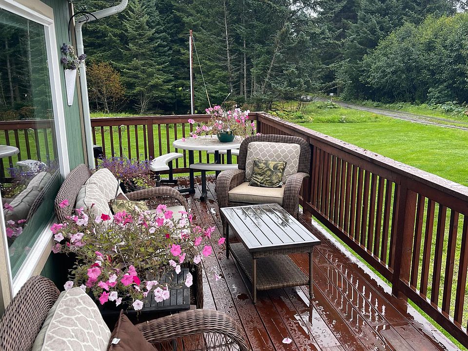 Large deck overlooking backyard
