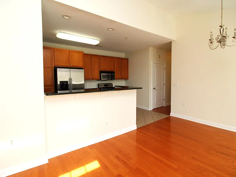 Open floor plan featuring breakfast bar