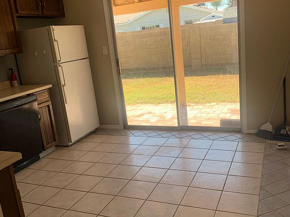 Kitchen and slider to backyard.