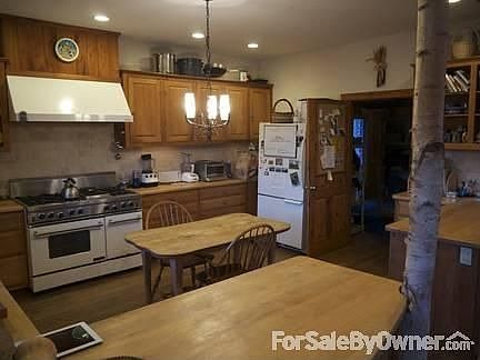 Back of the House
						:
						Taken below the kitchen gardens, looking up.