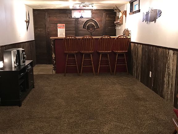 Basement fam room & dry bar.