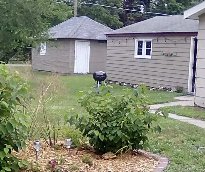 Spacious yard. Boathouse is not included. Two car garage is included