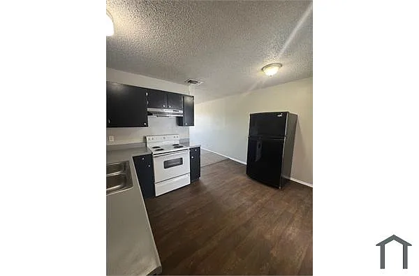 Building Photo - 8507 S Flores St #104