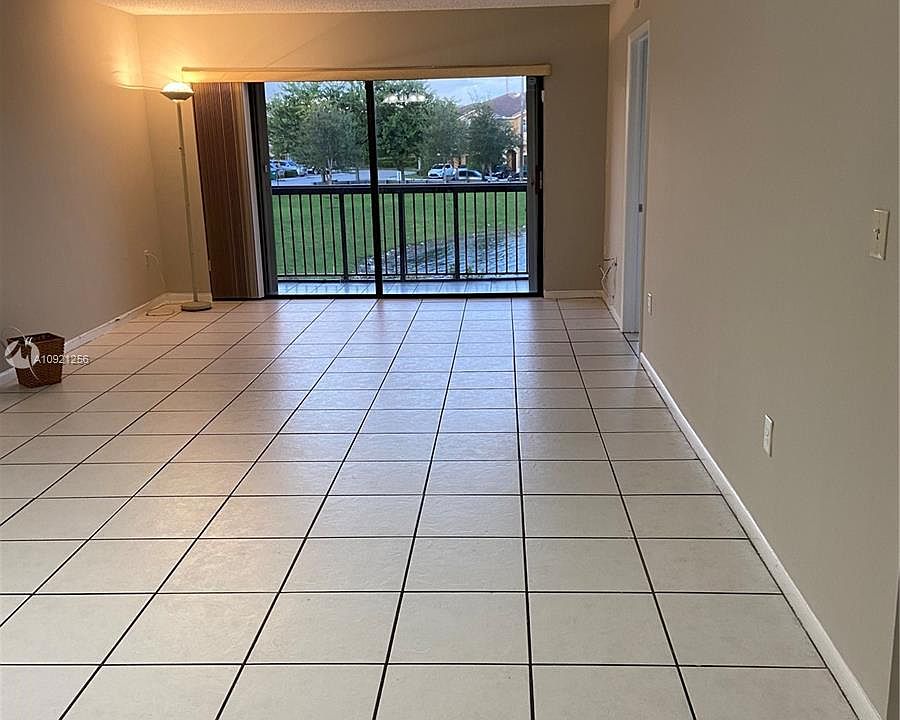 1st image of 10255 NW Nine Street Cir #205-7