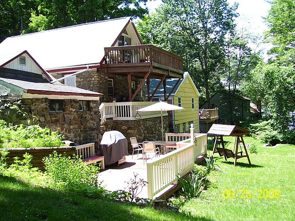 Decks overlooking backyard