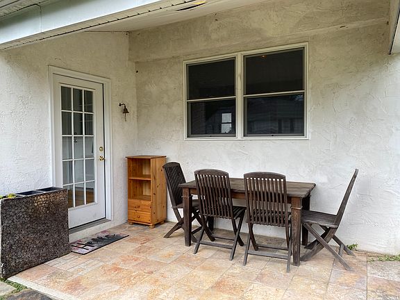 Porch with seating area and room for grill
